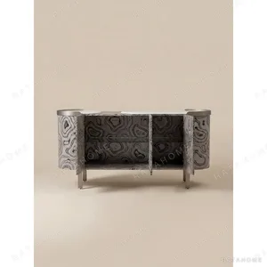 Curved Black Art-Texture Cabinet with Metal Trim and Drawers in black — in a room setting