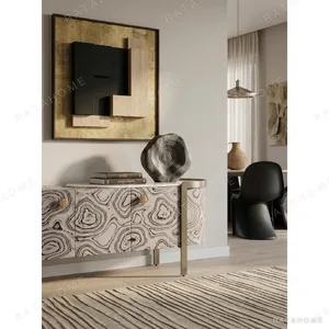 Curved Black Art-Texture Cabinet with Metal Trim and Drawers in black — in a room setting