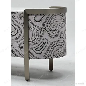 Curved Black Art-Texture Cabinet with Metal Trim and Drawers in black — in a room setting