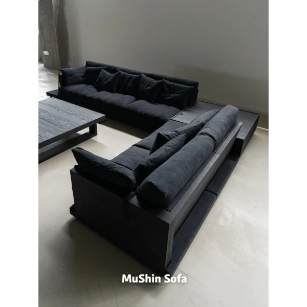 Black Linen Sofa with Loose Cushions in black — in a room setting