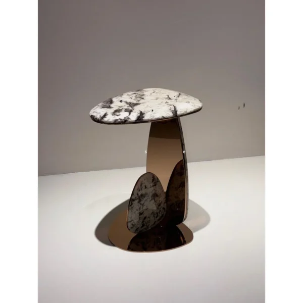 Mushroom Drop Marble Side Table on Rose Gold Steel Base in brushed brass — in a room setting