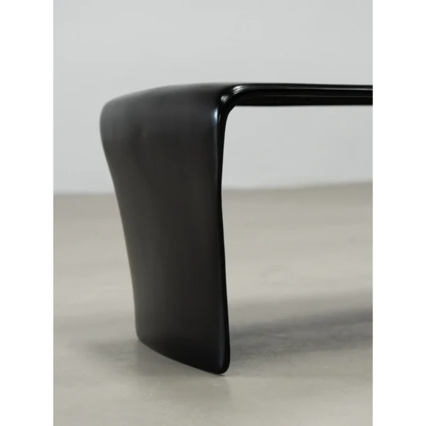 Cast Copper Low Table with Curved Ends in black — in a room setting