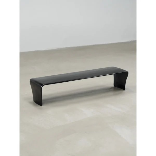 Cast Copper Low Table with Curved Ends in black — in a room setting