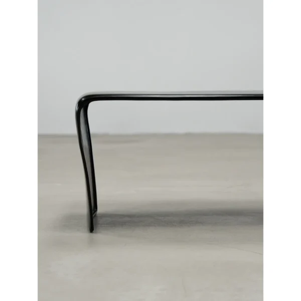 Cast Copper Low Table with Curved Ends in black — in a room setting