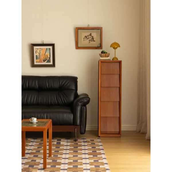 Narrow Teak Corner Cabinet with Eave-Shaped Drawers in clay — in a room setting