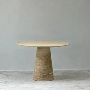 Cream Travertine Round Dining Table on Cone Base in oatmeal — front view