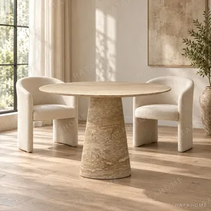 Cream Travertine Round Dining Table on Cone Base in oatmeal — in a room setting