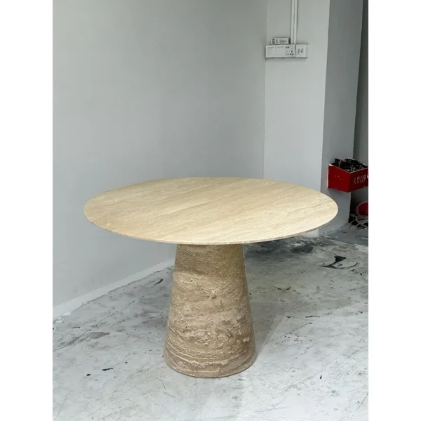 Cream Travertine Round Dining Table on Cone Base in oatmeal — in a room setting