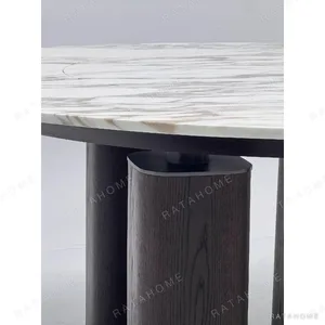White Stone Round Table in ivory — in a room setting