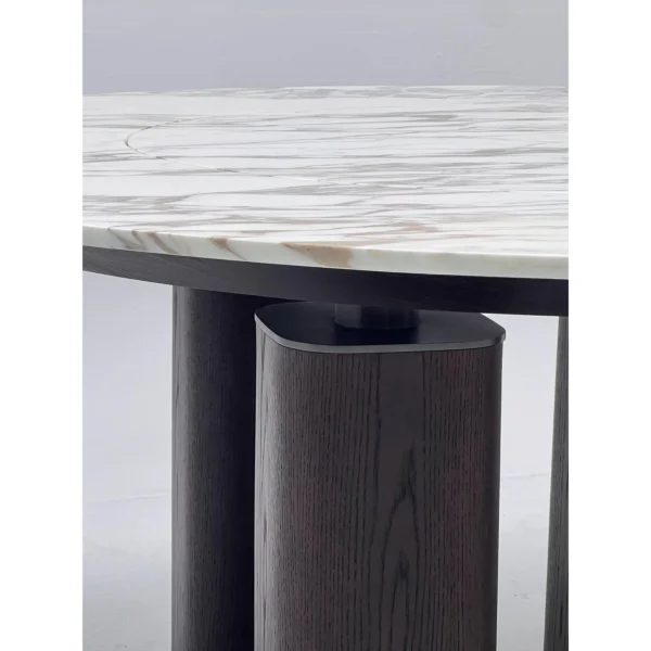 White Stone Round Table in ivory — in a room setting