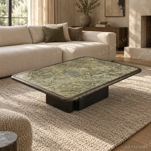 Green Marble Coffee Table with Black Ash Edge, 150 x 110 cm in olive — in a room setting