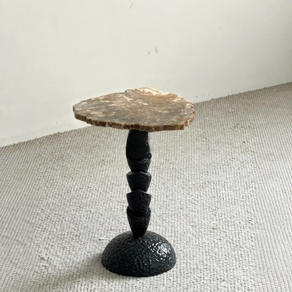 Natural Edge Marble Side Table on Carved Black Wood Base in clay — front view