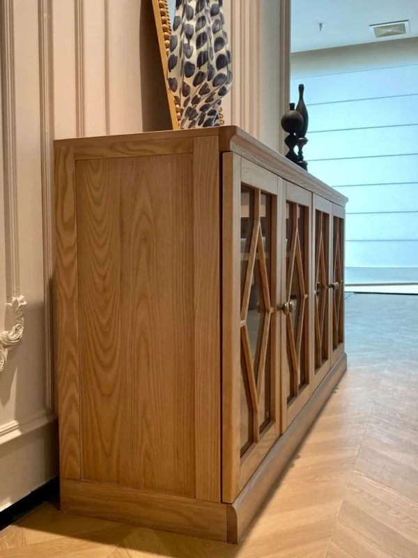 Tuscan Solid Wood Sideboard with Lattice Glass Doors in natural oak — in a room setting