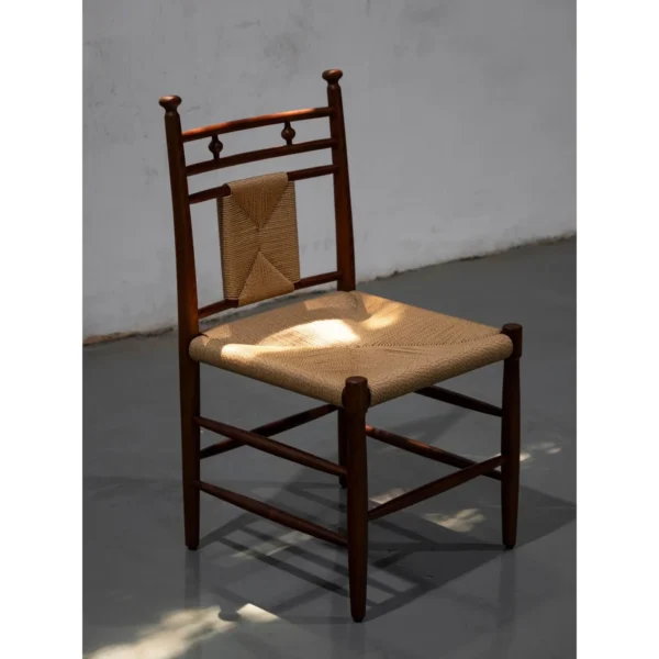 Tall Ladder-Back Dining Chair with Woven Rush Seat in clay — in a room setting