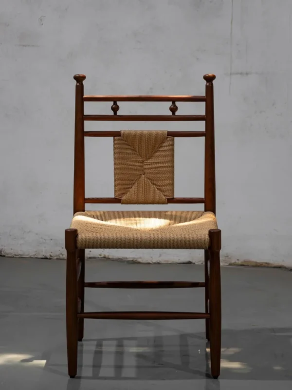 Tall Ladder-Back Dining Chair with Woven Rush Seat in clay — in a room setting