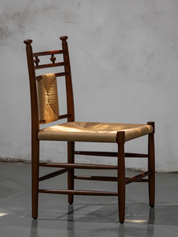 Tall Ladder-Back Dining Chair with Woven Rush Seat in clay — in a room setting