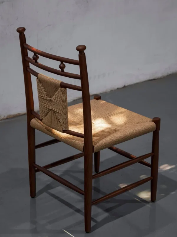 Tall Ladder-Back Dining Chair with Woven Rush Seat in clay — in a room setting