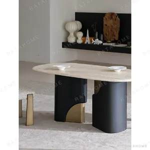Travertine Oval Dining Table on Black Oak Columns with Brass in oatmeal — in a room setting
