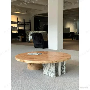 Round Burl Veneer Coffee Table in clay — in a room setting