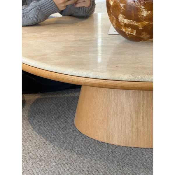 Travertine Round Coffee Table Pair in sand — in a room setting