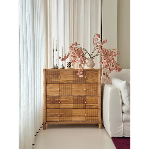 Natural Oak Four-Drawer Chest with Carved Stripes in natural oak — in a room setting