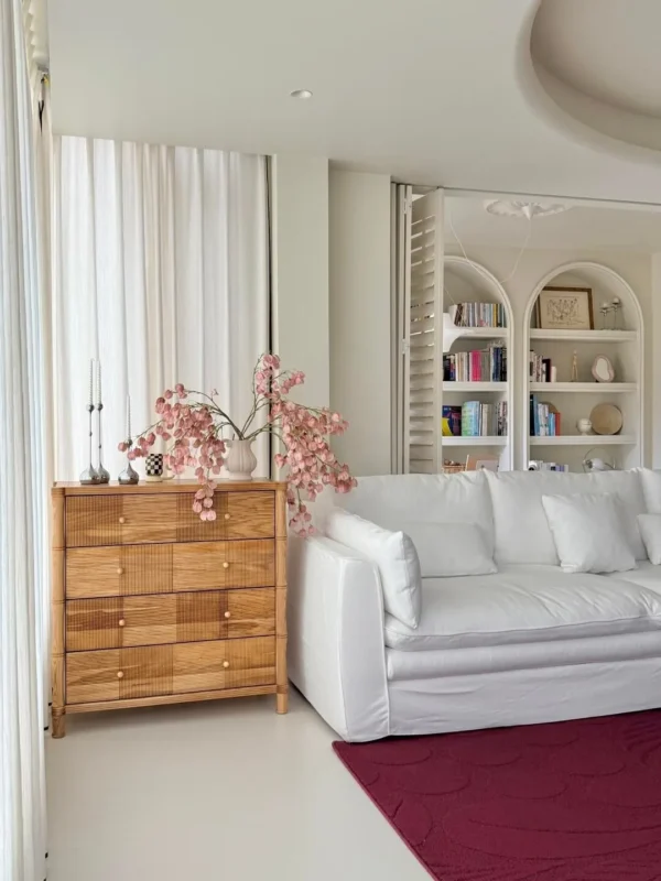 Natural Oak Four-Drawer Chest with Carved Stripes in natural oak — in a room setting