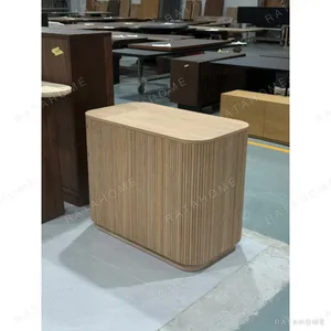 Fluted Natural Wood Rounded Sideboard in natural oak — in a room setting