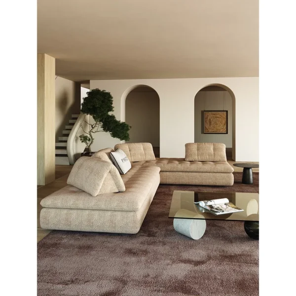 Naturalist Modular Sofa in sand — in a room setting