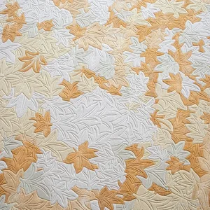Maple Leaf Relief Rug in Cream and Amber — in a room setting