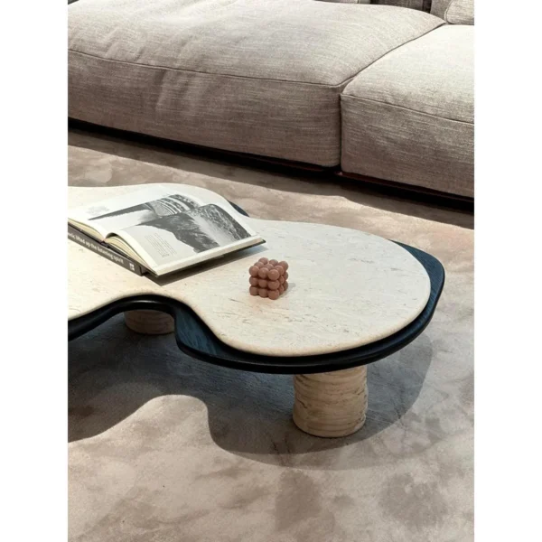 Nebula Travertine Cloud Coffee Table in oatmeal — in a room setting