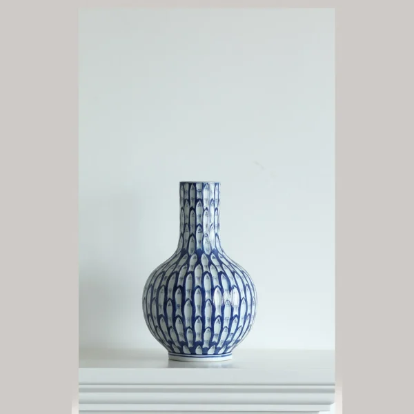 Blue and White Fish-Scale Hand-Painted Ceramic Bottle Vase in blue — in a room setting