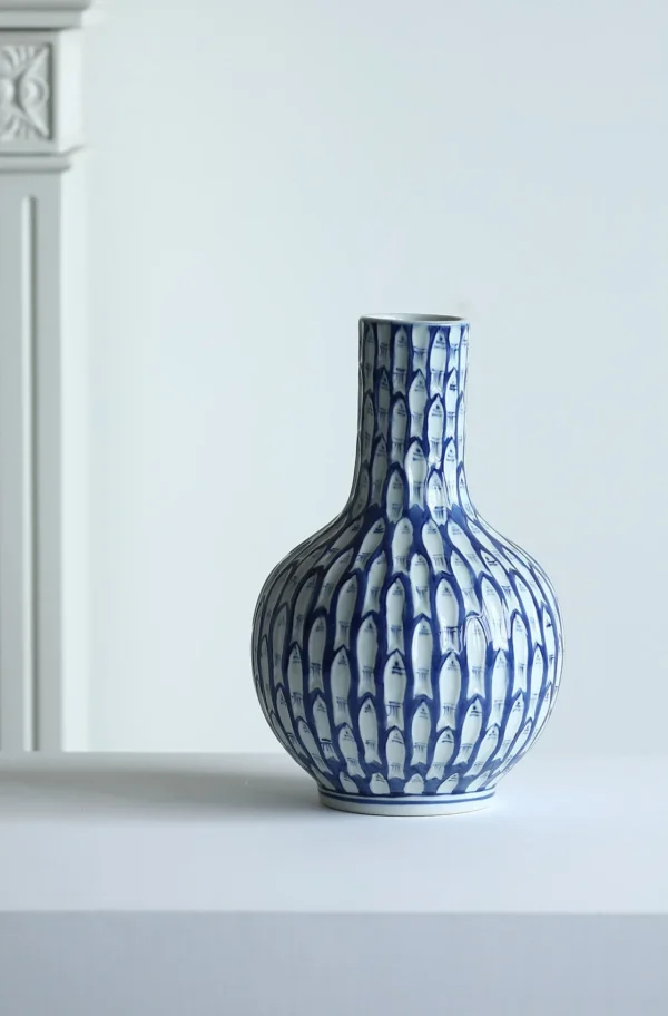 Blue and White Fish-Scale Hand-Painted Ceramic Bottle Vase in blue — in a room setting
