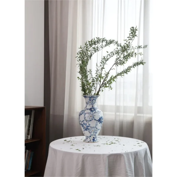 Hand-Painted Blue and White Gilded Fishtail Floor Vase in blue — in a room setting