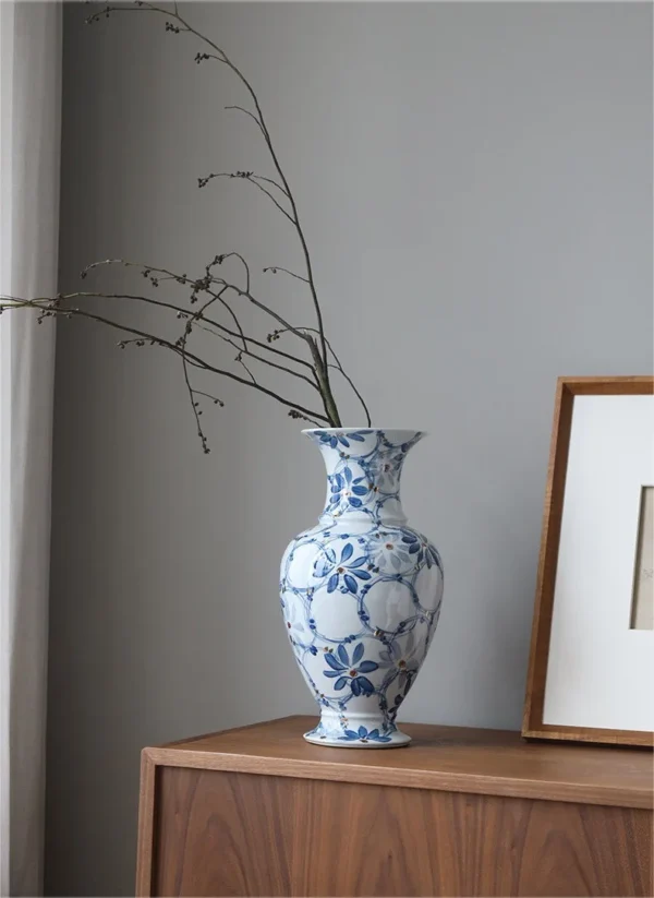 Hand-Painted Blue and White Gilded Fishtail Floor Vase in blue — in a room setting