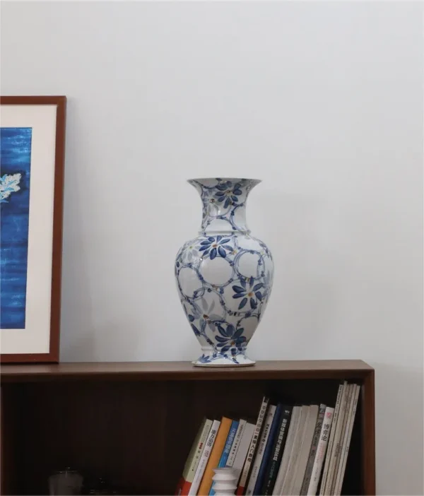 Hand-Painted Blue and White Gilded Fishtail Floor Vase in blue — in a room setting