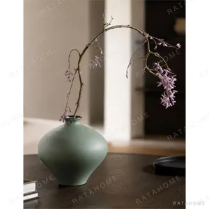 Designer Matte Celadon Ceramic Vases, Apple or Willow-Leaf in olive — in a room setting