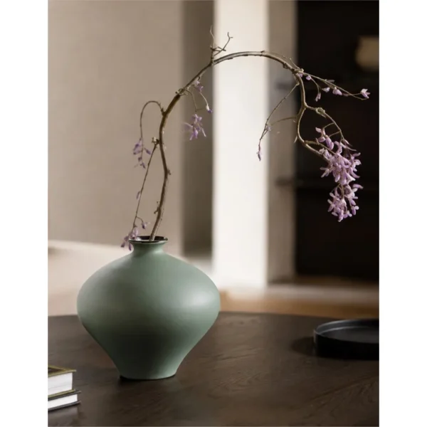 Designer Matte Celadon Ceramic Vases, Apple or Willow-Leaf in olive — in a room setting