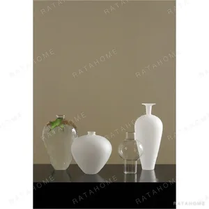 Clear Borosilicate Glass Vases in ivory — in a room setting