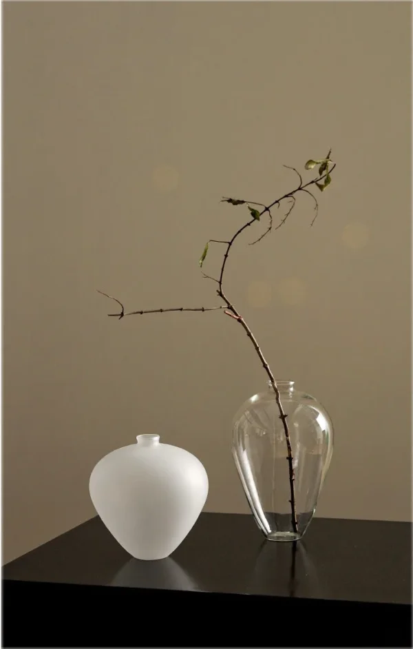 Clear Borosilicate Glass Vases in ivory — in a room setting