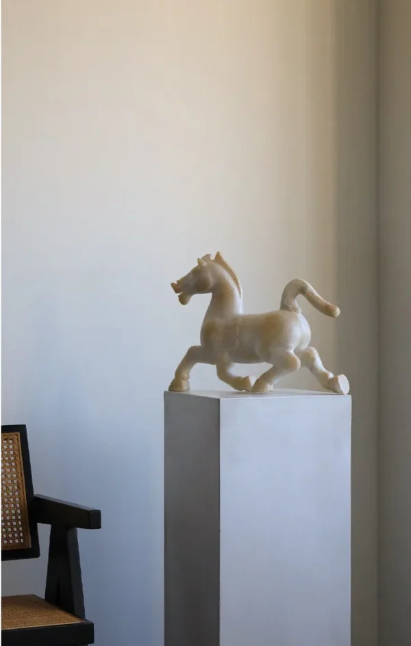 Galloping Horse Sculpture in Jade-Effect Resin — in a room setting