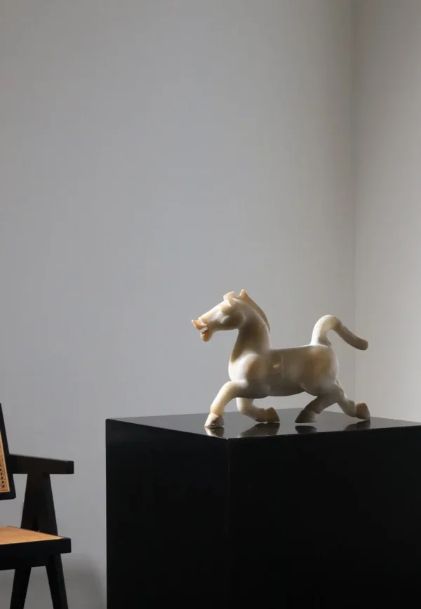 Galloping Horse Sculpture in Jade-Effect Resin — in a room setting