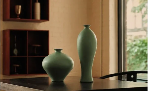 Designer Matte Celadon Vases in olive — in a room setting
