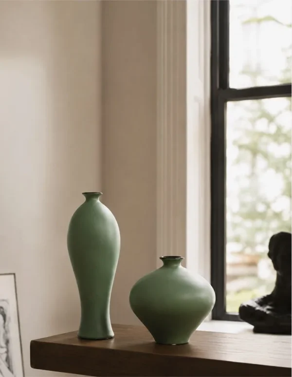 Designer Matte Celadon Vases in olive — in a room setting