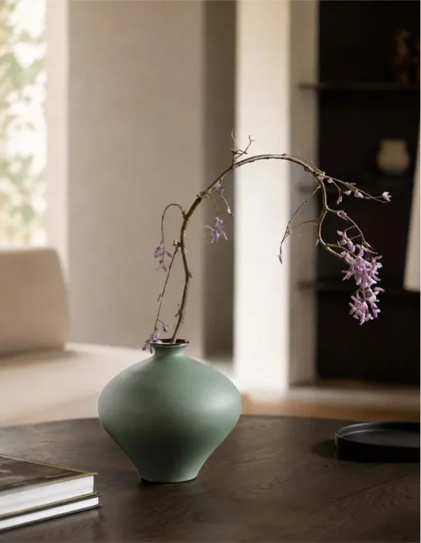 Designer Mist Green Ceramic Vases in olive — in a room setting