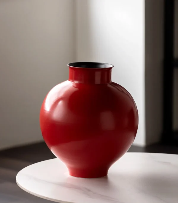 Cinnabar Red Glossy Round-Belly Ceramic Vase with Flared Lip in red — in a room setting
