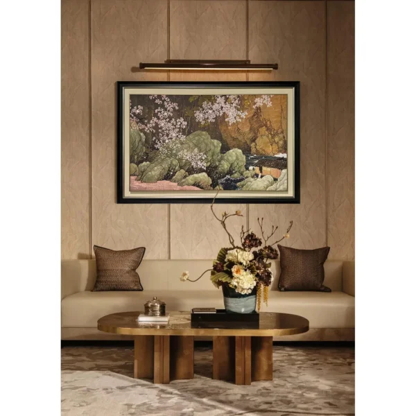 Wide Cherry Blossom Landscape Wall Art with Picture Light in olive — in a room setting