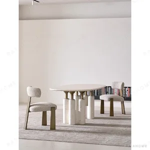 Square-Back Dining Chair on Brushed Bronze Legs in oatmeal — in a room setting