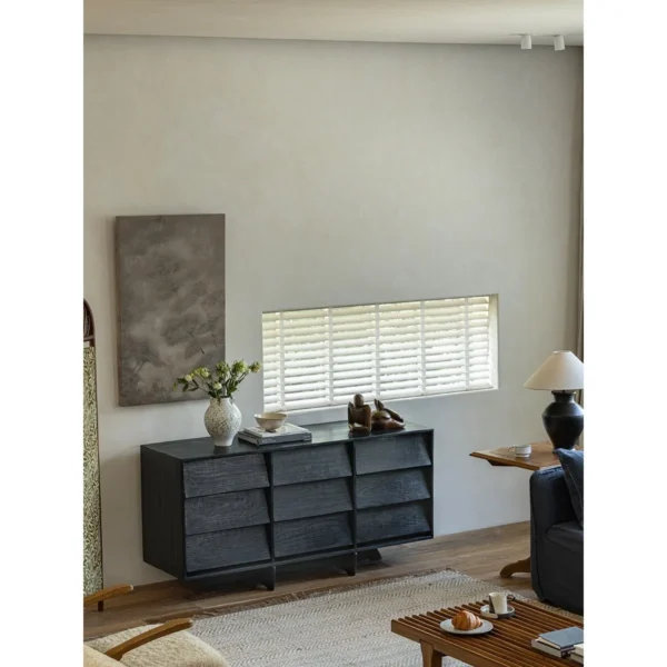Reclaimed Wood Nine-Drawer Chest in Black — in a room setting