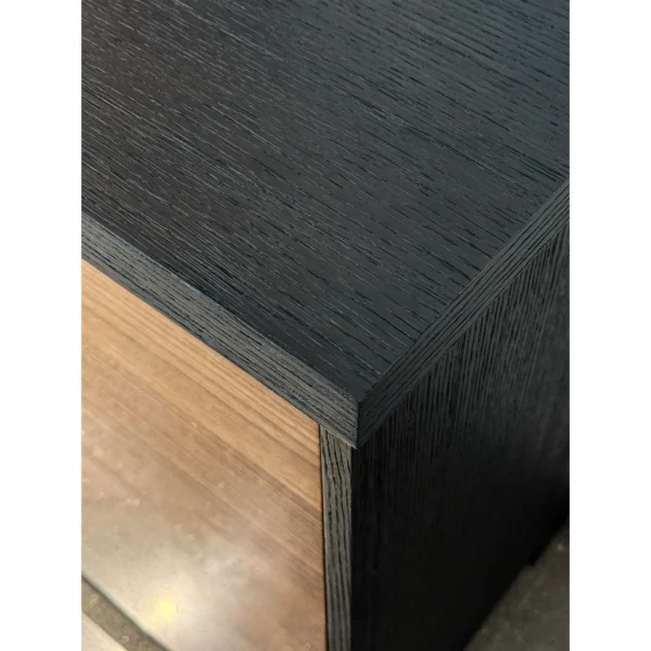 Noye Smoked Oak and Gloss Walnut Sideboard in black — in a room setting