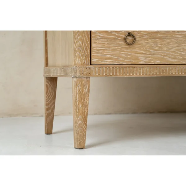 Whitewashed Oak Six-Drawer Dresser in natural oak — in a room setting